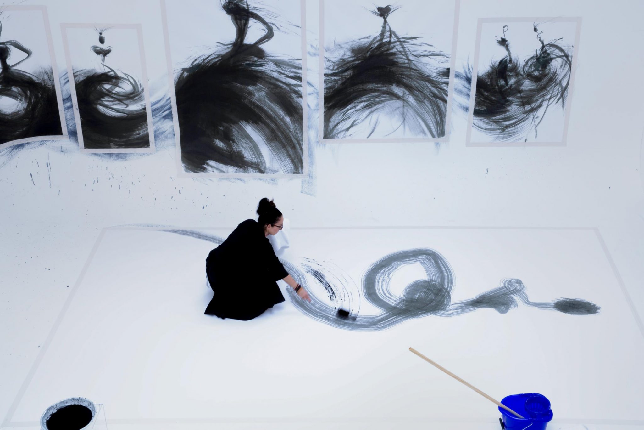  | SHOWStudio | Nightlight Series: On 26 April 2019, artist Tobie Giddio took up residency in the SHOWstudio space to create a large-scale fashion illustration live. The broadcast showcases Giddio’s creative process from start to finish, documenting her as she paints the walls and floor of the studio cove with ink. For this work, Giddio utilises a unique set of tools, comprising large Japanese brushes, mops and feather dusters.  | 13