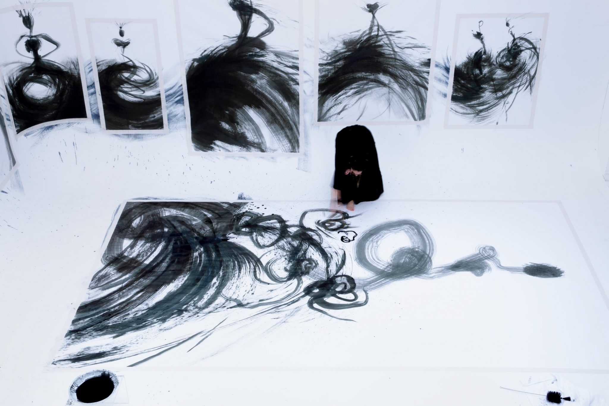  | SHOWStudio | Nightlight Series: On 26 April 2019, artist Tobie Giddio took up residency in the SHOWstudio space to create a large-scale fashion illustration live. The broadcast showcases Giddio’s creative process from start to finish, documenting her as she paints the walls and floor of the studio cove with ink. For this work, Giddio utilises a unique set of tools, comprising large Japanese brushes, mops and feather dusters.  | 14